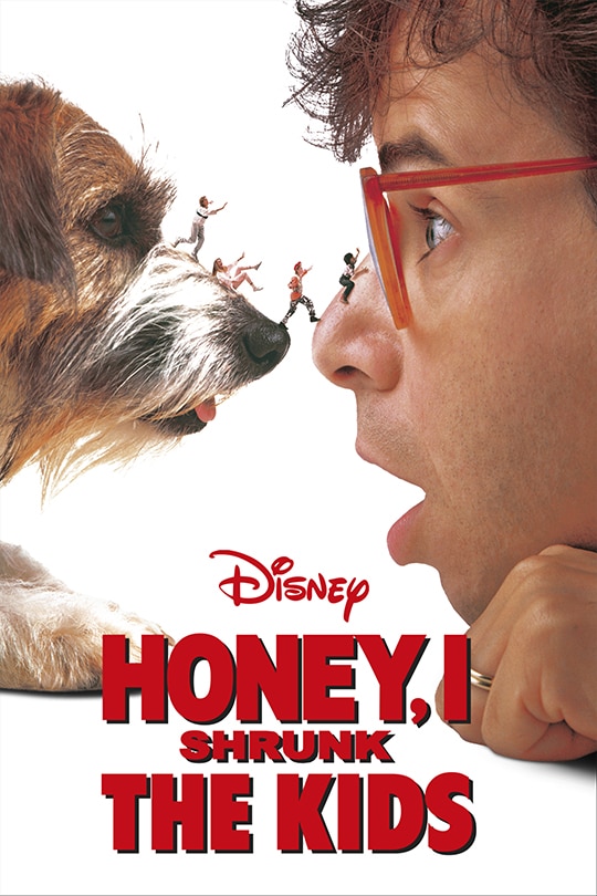 Rick Moranis is nose to nose with the dog Quark as his children and the neighbors run across their noses on the movie poster for Honey I Shrunk the kids
