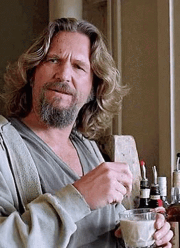 The dude stirring a white russian.