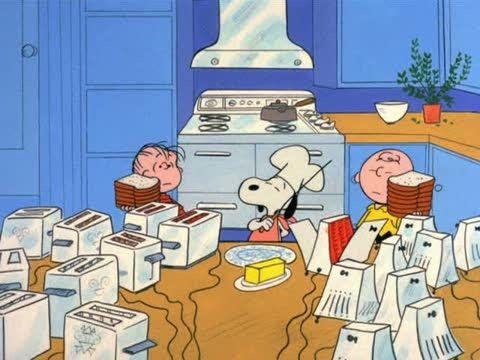 Snoopy, Charlie Brown, and Linus in the kitchen making toast with literally 18 toasters on the table.